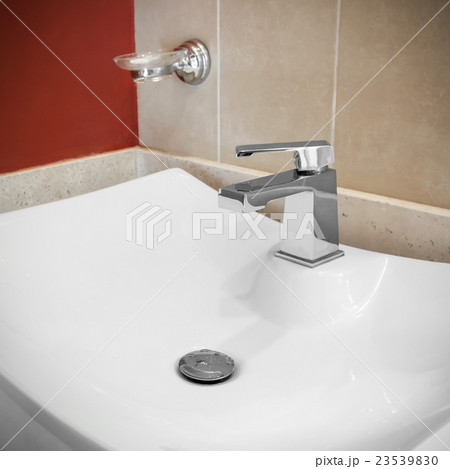Faucet in bathroom 23539830
