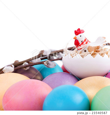 Chicken toy on easter eggs 23540587