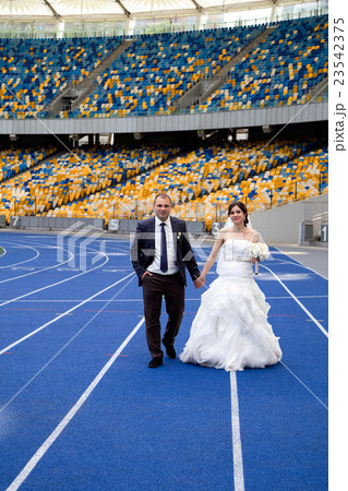 Newlyweds at the stadium 23542375