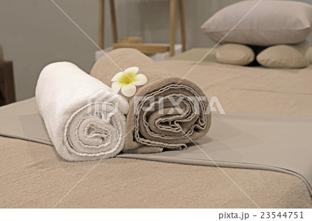 frangipani flower on bath towe 23544751