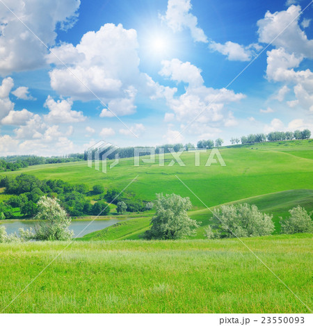 picturesque hills, forest and blue sky picturesque hills, forest and blue sky 23550093