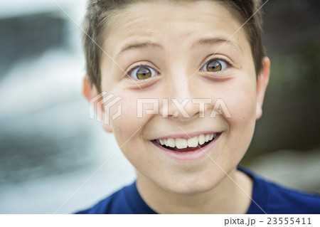 close up of a cute 8 year old boy 23555411