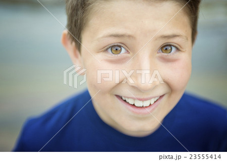 close up of a cute 8 year old boy 23555414