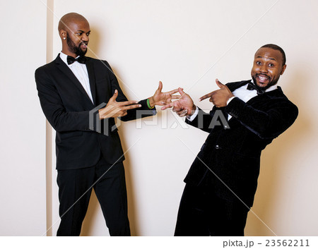 two afro-american businessmen in black suits 23562211