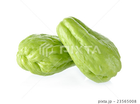 uncooked whole fresh chayote on white background 23565008