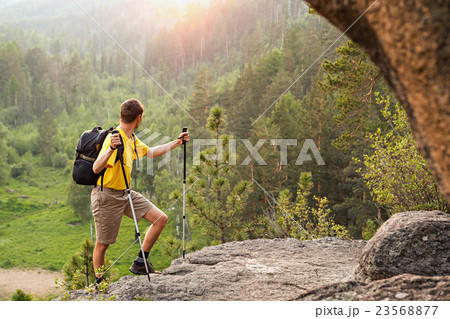 Backpacker go up mountain Backpacker go up mountain 23568877