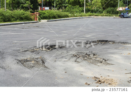 Asphalt on the car park was demolished due to poor 23577161