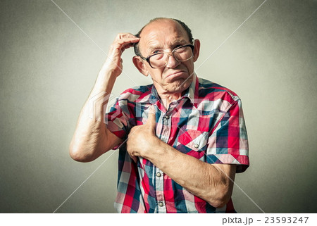 portrait of the funny senior man thinking 23593247