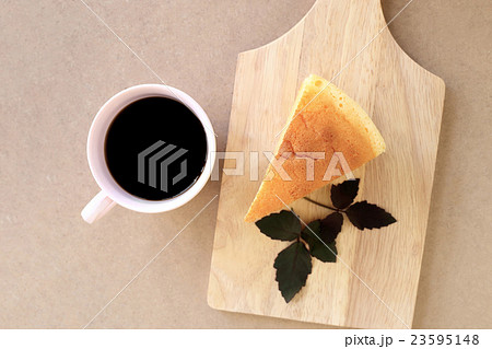 Japanese style Cheesecake and cup of black coffee. 23595148