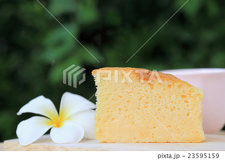Japanese style Cheesecake with green background. Japanese style Cheesecake with green background. 23595159