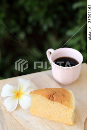 Japanese style Cheesecake and cup of black coffee. Japanese style Cheesecake and cup of black coffee. 23595165