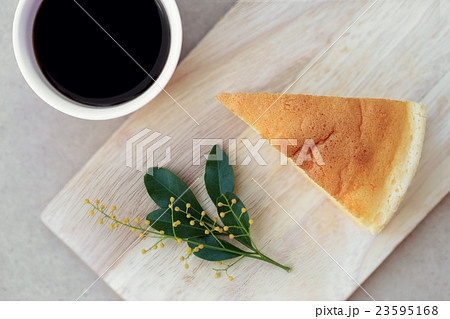 Japanese style Cheesecake and cup of black coffee. Japanese style Cheesecake and cup of black coffee. 23595168