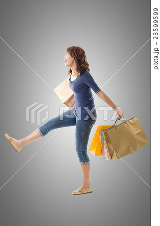 Cheerful shopping woman 23599599