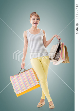 Cheerful shopping woman 23599618