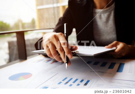 female manager putting his ideas and writing  23601042