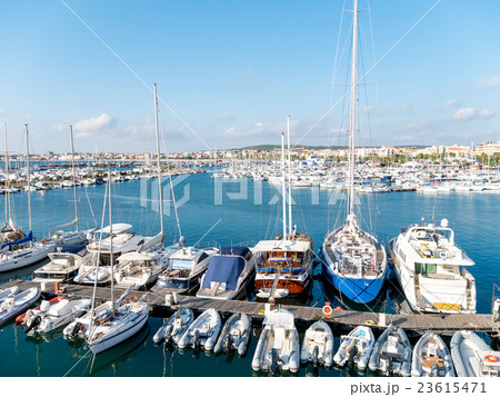 Classic white yachts anchored in the port  23615471