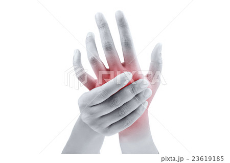 Woman massaging her painful hand Woman massaging her painful hand 23619185