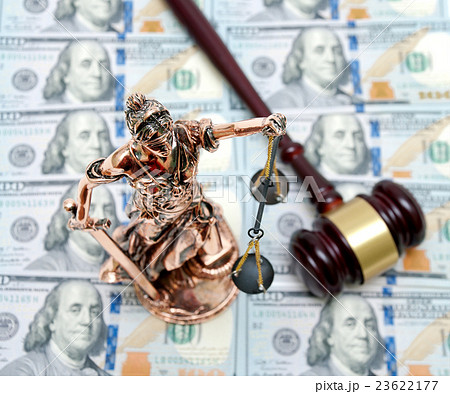 Statue of Justice on dollars background Statue of Justice on dollars background 23622177