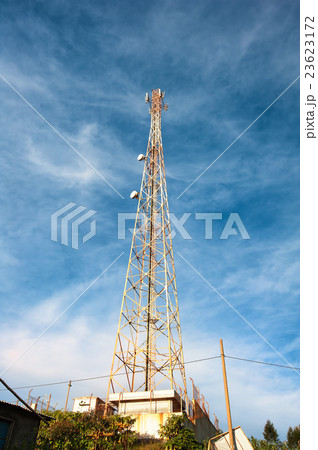 old Antennas of cellular systems with blue sky 23623172