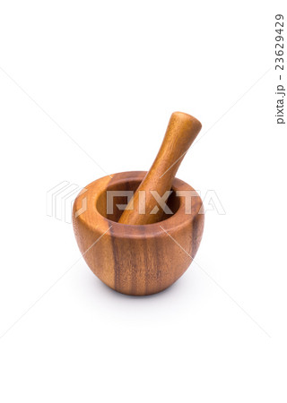 wooden mortar on a white background wooden mortar on a white background 23629429