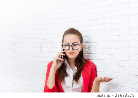 Businesswoman serious negative cell phone call Businesswoman serious negative cell phone call 23633575