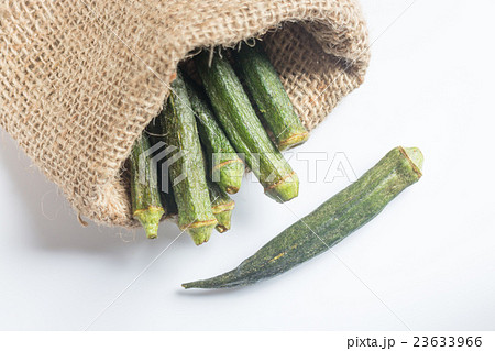 Healthy okra chips on clean background Healthy okra chips on clean background 23633966