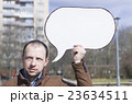a man with a sign 23634511