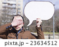 a man with a sign 23634512