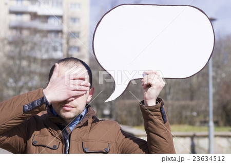 a man with a sign a man with a sign 23634512