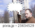 a man with a sign 23634529