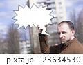 a man with a sign 23634530