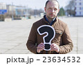 portrait of a man with a sign 23634532