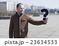 portrait of a man with a sign 23634533