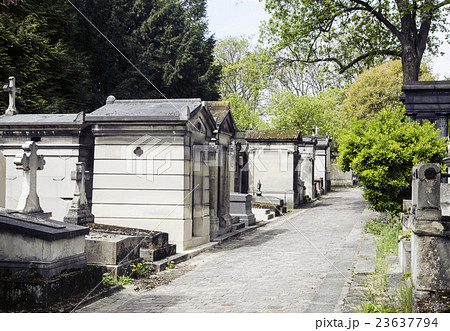 Tombstones in cemetery at dusk, gothic style 23637794