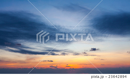 Sunset sky with dramatic clouds 23642894
