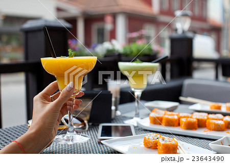 Woman with fresh papaya smoothie Woman with fresh papaya smoothie 23643490