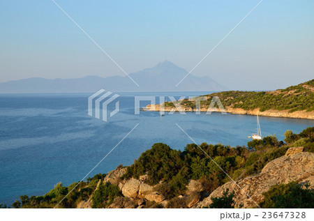 Greek Bay and Athos Mountain in Sunset 23647328