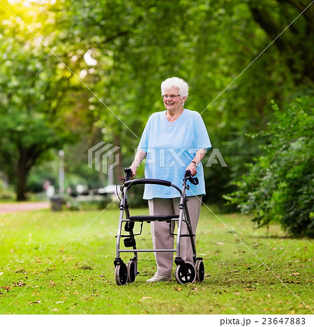 Senior lady with a walker 23647883
