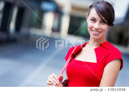 Portrait of businesswoman outside 23653096