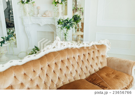 Bright and fresh bedroom decorated with a flowers. 23656766