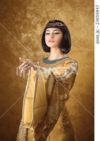 Beautiful Egyptian woman like Cleopatra pointing 23659847