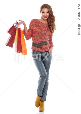 woman with shopping bags. Studio shoot 23661478
