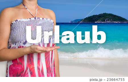 Urlaub (in german Holiday) concept is presented by woman on the 23664755
