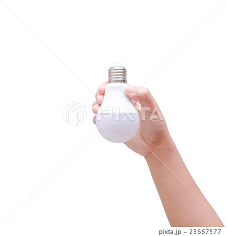 Woman hand holding LED bulb isolated on white Woman hand holding LED bulb isolated on white 23667577
