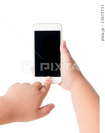 kid hand touch on mobile smart phone 23672731