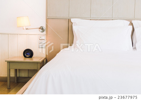 Pillow on bed 23677975