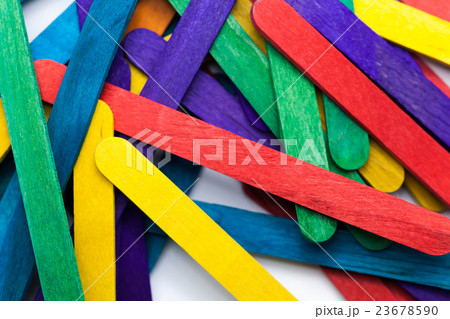 Colorful popsicle sticks over white background Colorful popsicle sticks over white background 23678590