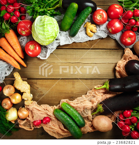 Square composition with fresh vegetables on wooden Square composition with fresh vegetables on wooden 23682821