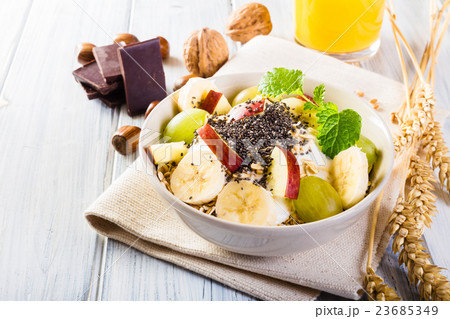 Bowl of fresh fruit. Healthy breakfast. 23685349