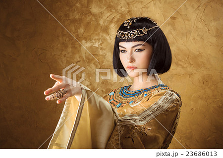 Beautiful Egyptian woman like Cleopatra pointing 23686013